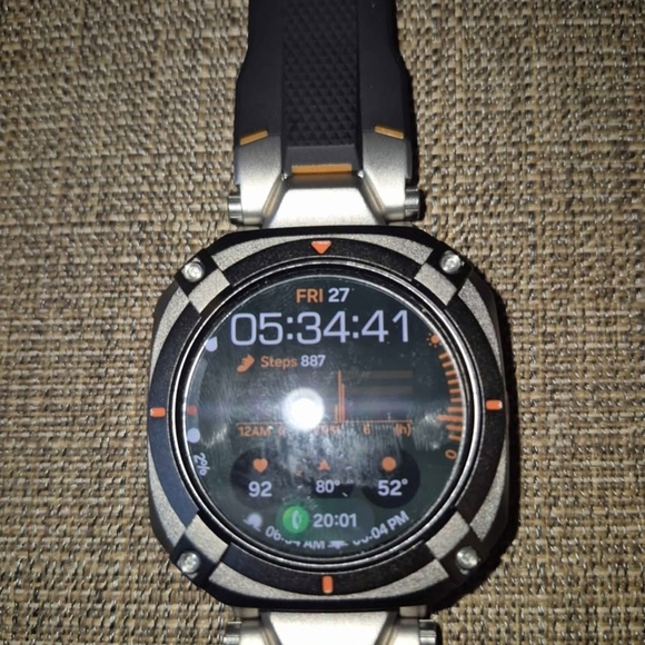 Samsung Galaxy Watch Ultra with Black, Gray, and Green Bands